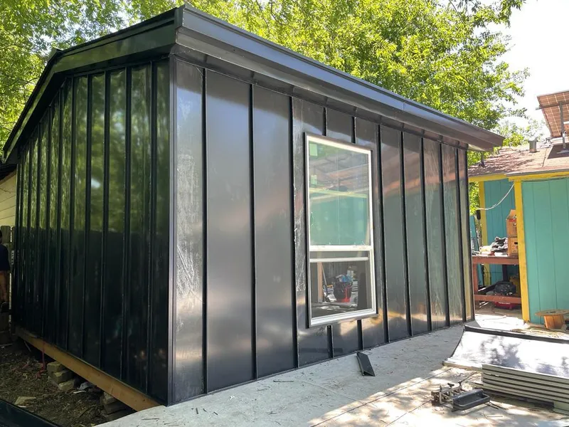 Black standing seam metal wall panels for Roof Inspection in Moncks Corner